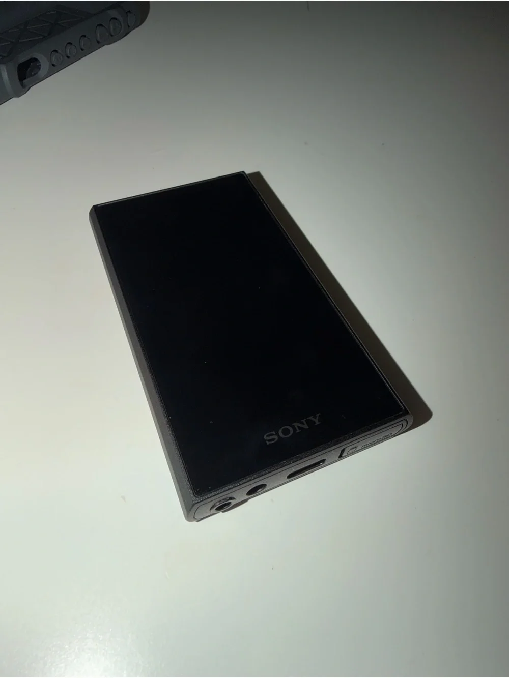Sony Portable Media Player with Black Silicone Case